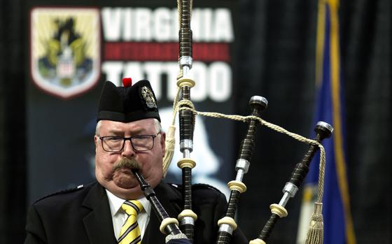 Thom Metz of Virginia Beach playing with other members of the Tidewater Pipes and Drums in February 2024 at Scope in Norfolk. The Virginia Arts Festival was announcing the participating nations for the Virginia International Tattoo that April. (Bill Tiernan / For The Virginian-Pilot)